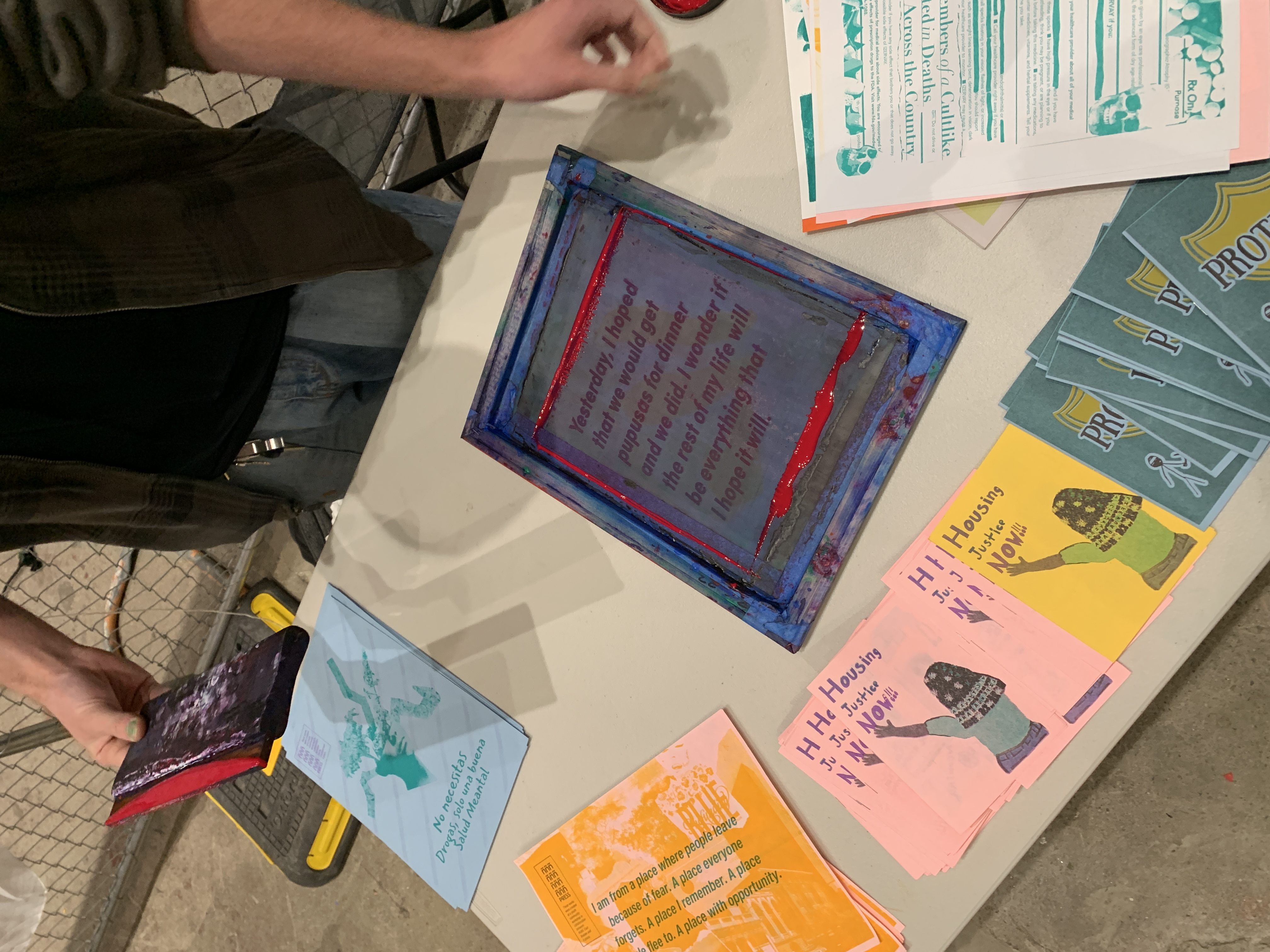 Printed matter arranged across the ñ press table