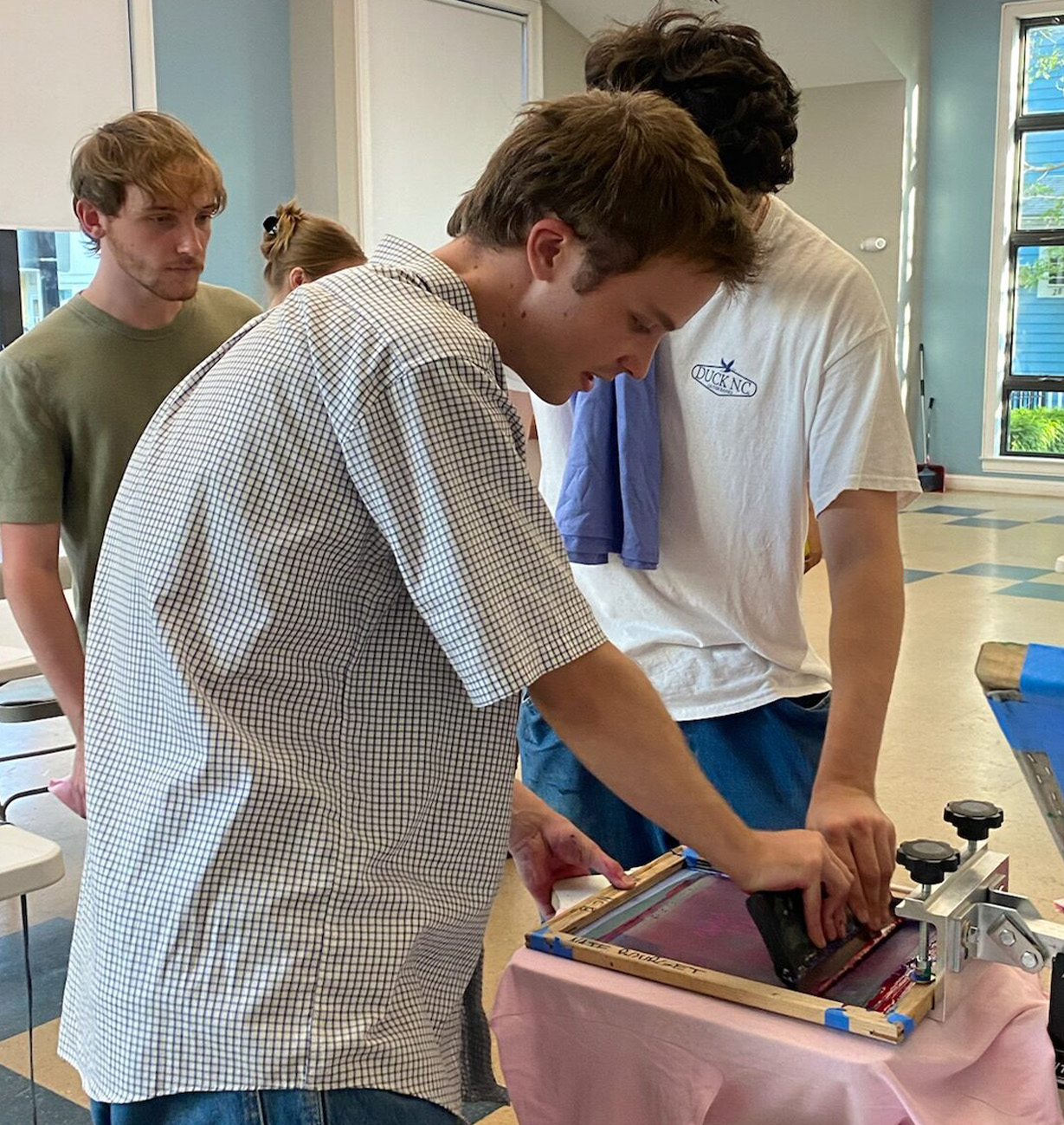 Workshop materials and shirts during Silkscreen Night