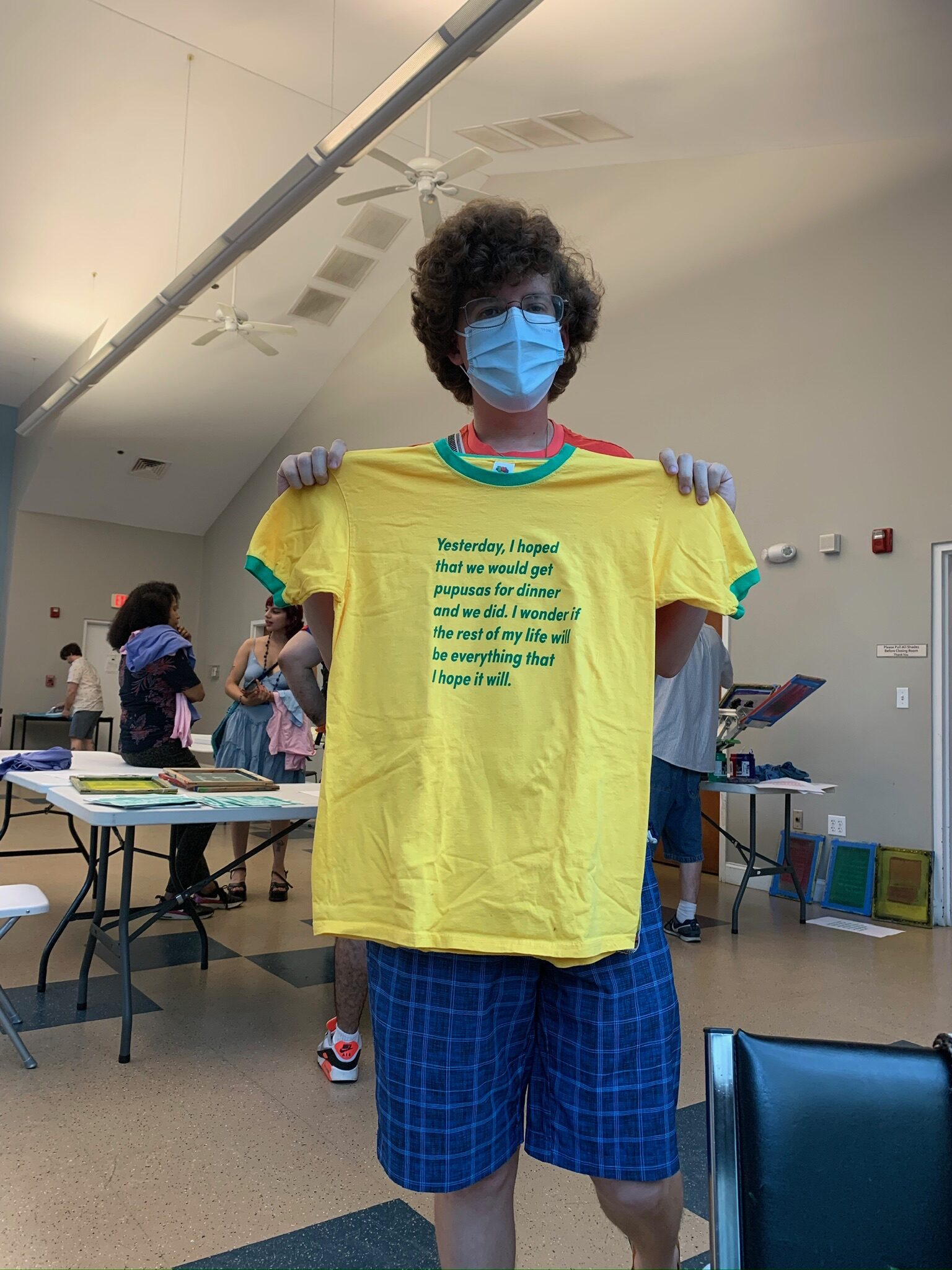 Workshop participant printing at Silkscreen Night