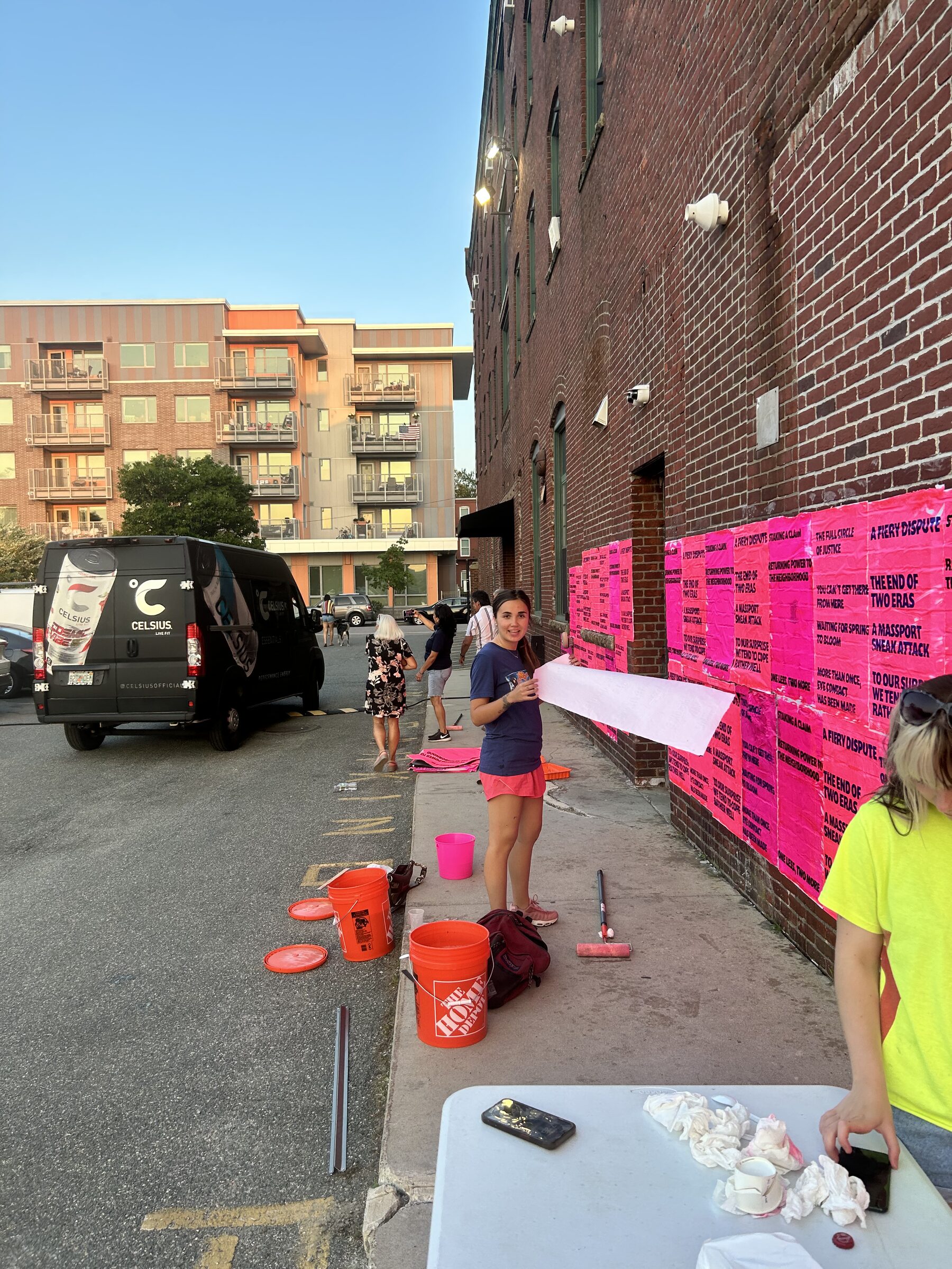 Preparing the wheatpaste installation outside Atlantic Works Gallery