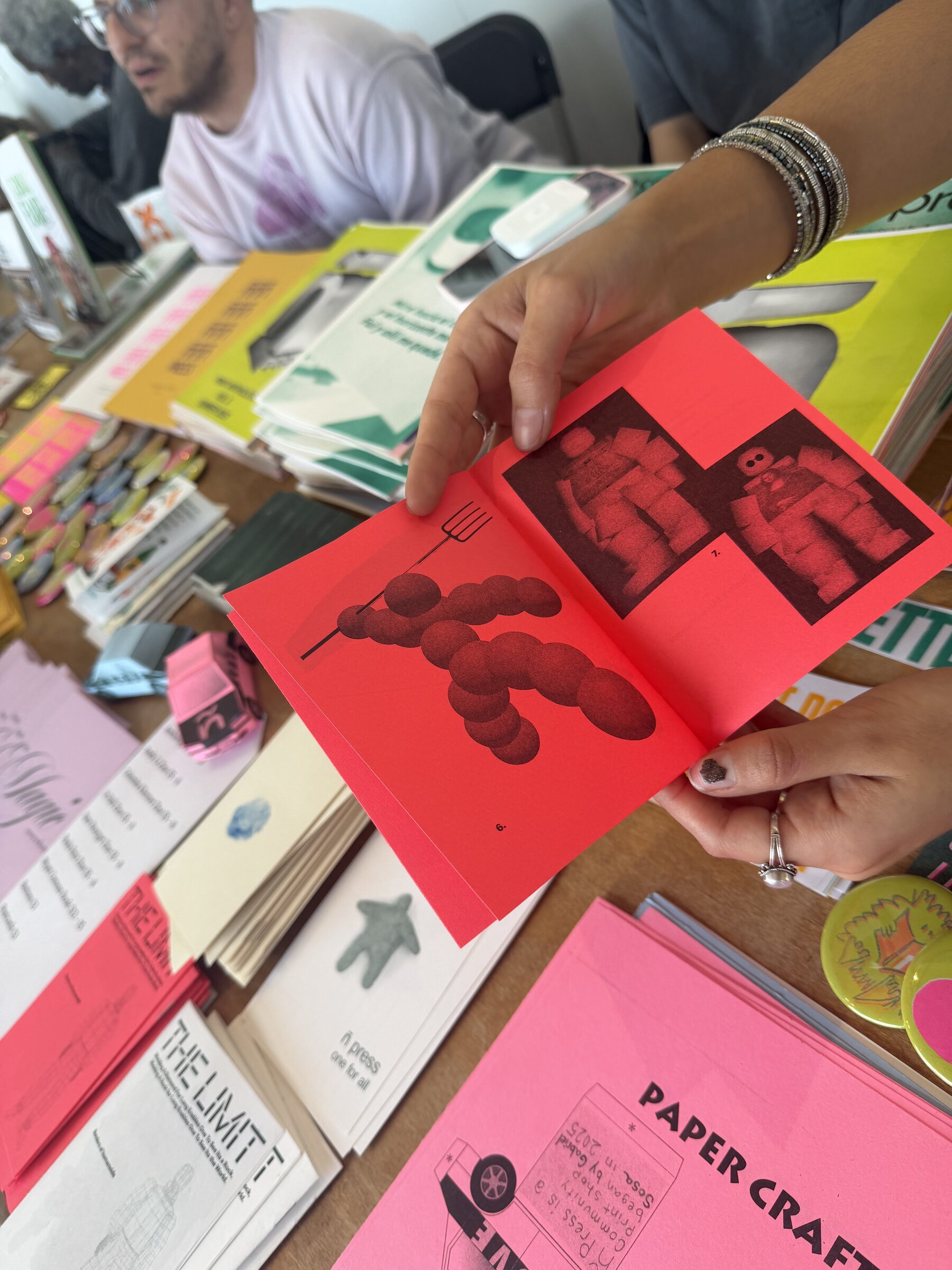 Publication being viewed at the ñ press table